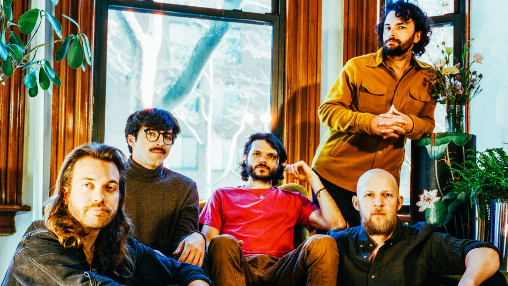 Goose band members posing for a photo